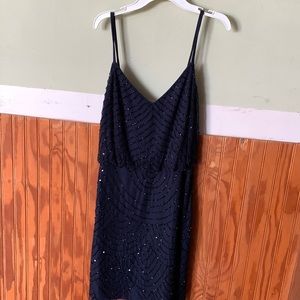 This is a Adrianna papell cocktail dress very nice it navy